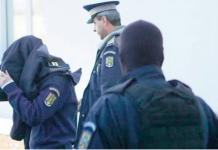 Polițist arestat pentru trafic de influență. A primit 13.000 de euro în sediul poliției